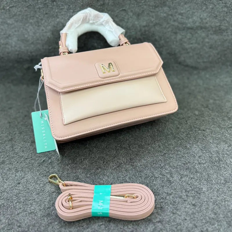 Imported Elegant Pink Leather Handbag with Gold Accents