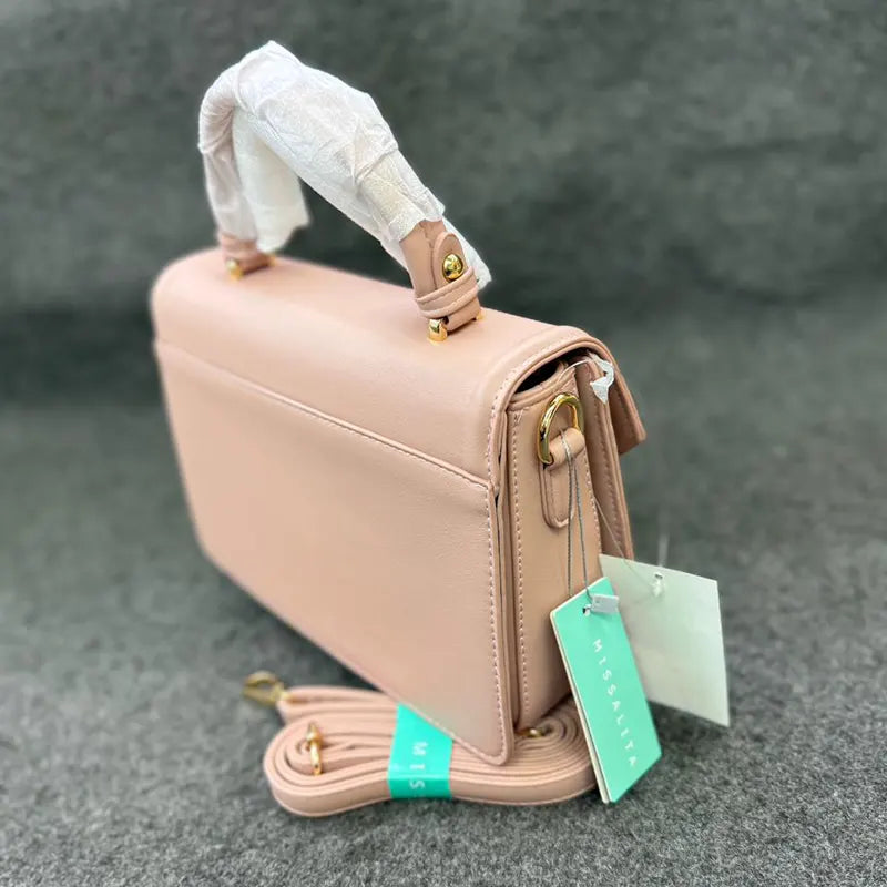 Imported Elegant Pink Leather Handbag with Gold Accents