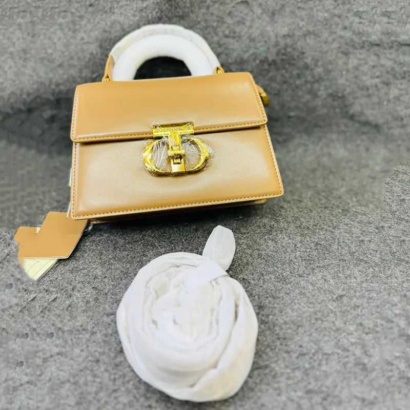Mini Structured Tan Handbag with Gold Buckle Accent