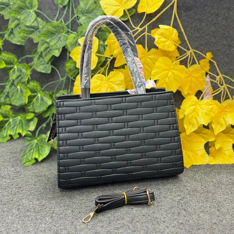 Elegant Black Textured Handbag with Detachable Strap