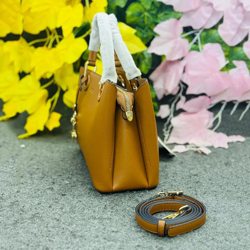 Classic Tan Faux Leather Handbag with Gold Star Charm – Elegant Everyday Style