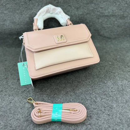 Imported Elegant Pink Leather Handbag with Gold Accents