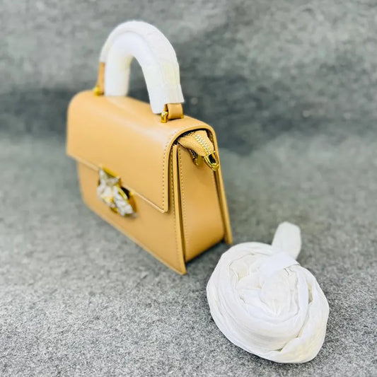 Mini Structured Tan Handbag with Gold Buckle Accent