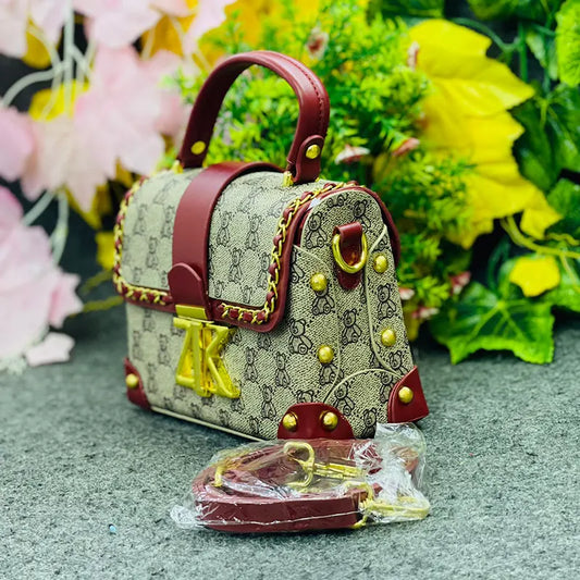 Luxury Monogrammed Handbag with Burgundy Accents & Gold Stud Detailing