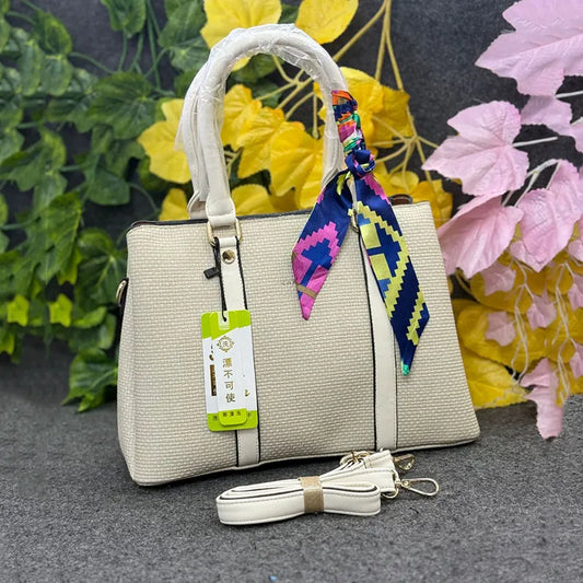 Cream Structured Ladies Handbag with Colorful Scarf Accent – Elegant & Versatile