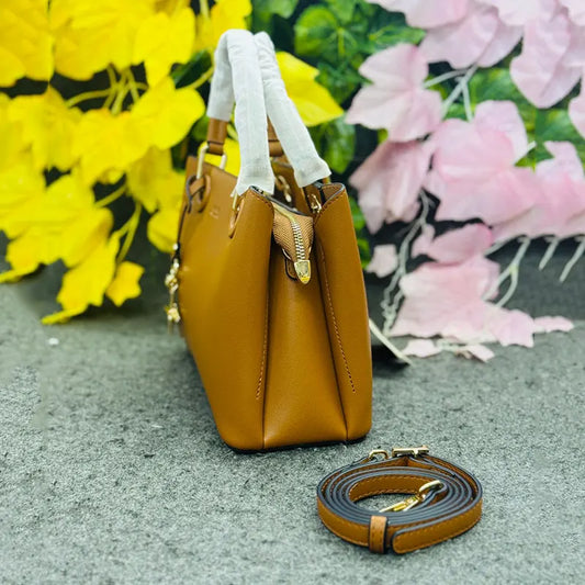 Classic Tan Faux Leather Handbag with Gold Star Charm – Elegant Everyday Style